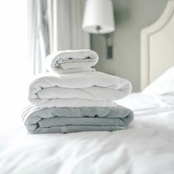 Towels On Bed In Hotel Room