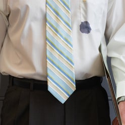 Businessman with an ink stained shirt