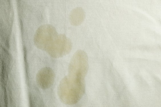 Oil stain on white cloth