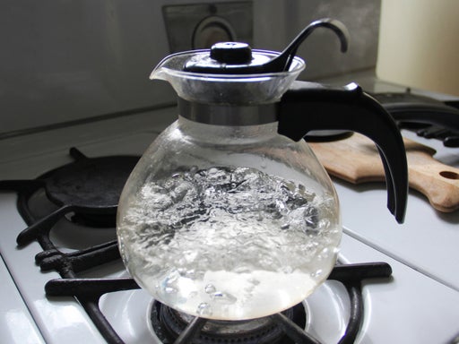 tea kettle boiling on stove