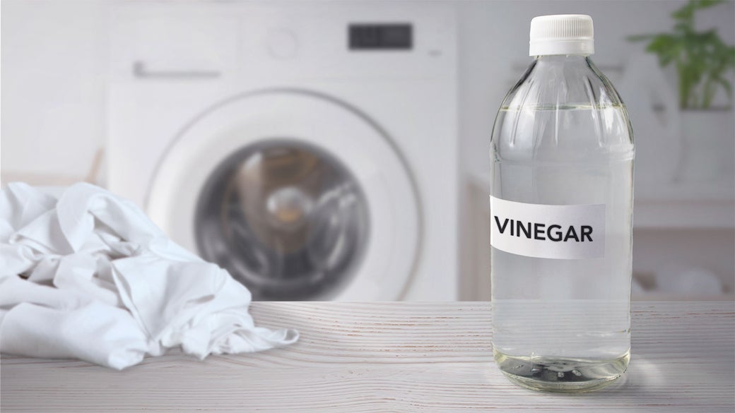 washing machine with vinegar bottle